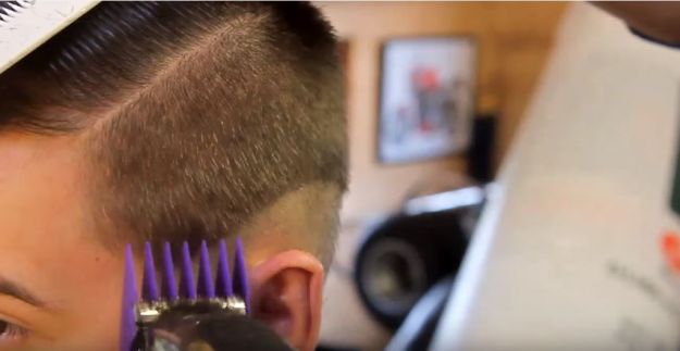Step 3. Use the longest guard to trim the remaining hair at the side | Trends and Style: How To Do A Fade Haircut With Disconnected Top